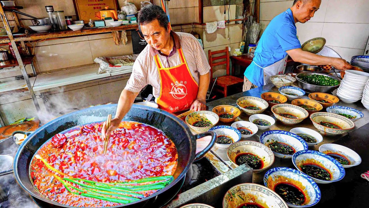 A Sichuan chef cooking in a Chengdu back-alley kitchen